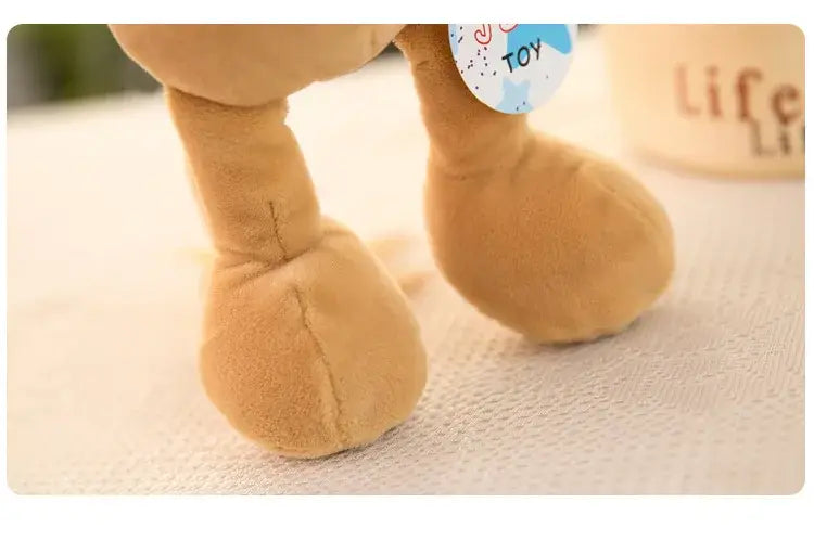 tan plush toy legs with soft rounded feet and stitched seams of lion elephant tiger stuffed animal toy viewed from the back side
