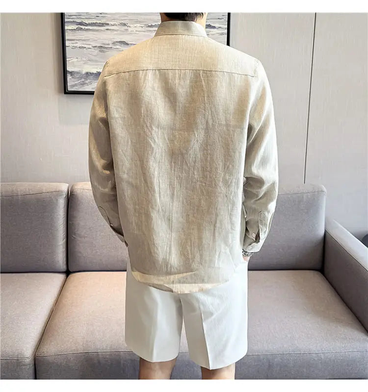 Beige linen long-sleeved shirt with a subtle textured weave and classic collar in a men’s linen mandarin collar shirt design.