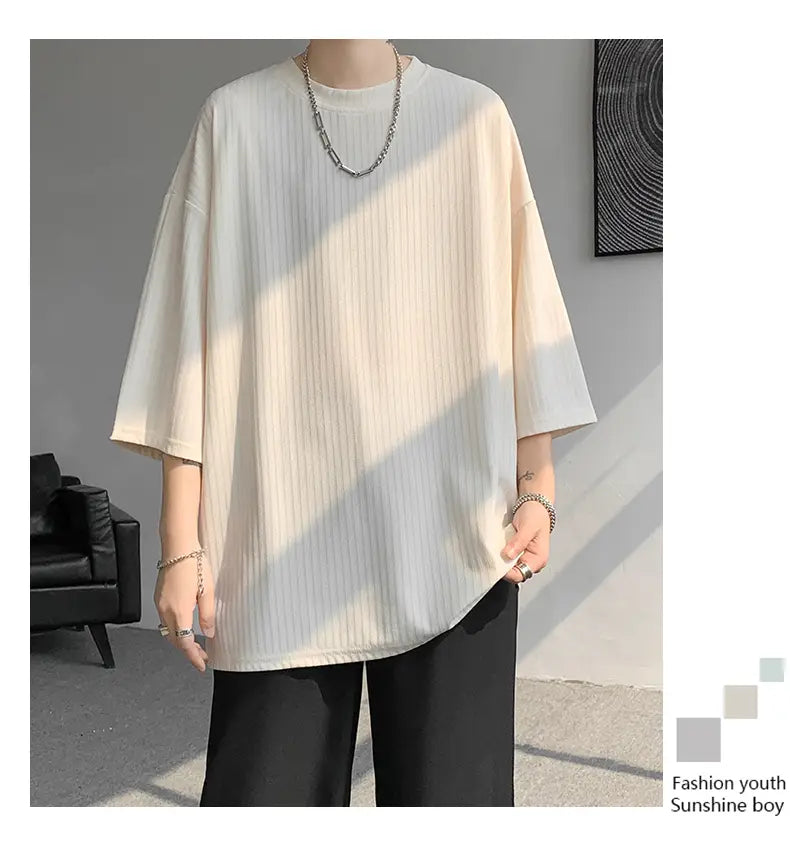 Off-white ribbed cotton men striped oversized summer t-shirt with a relaxed fit and short sleeves.