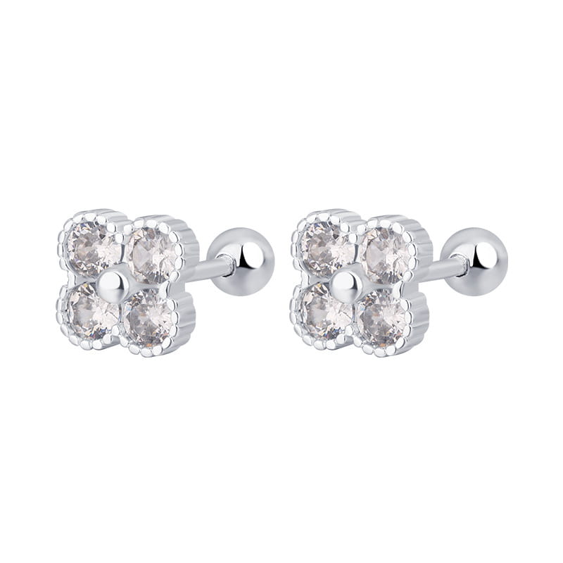 Pendientes tipo clavo de flor de cuatro piedras en plata de ley con diseño de trébol de cuatro hojas plateado, con acentos de cristal transparente.