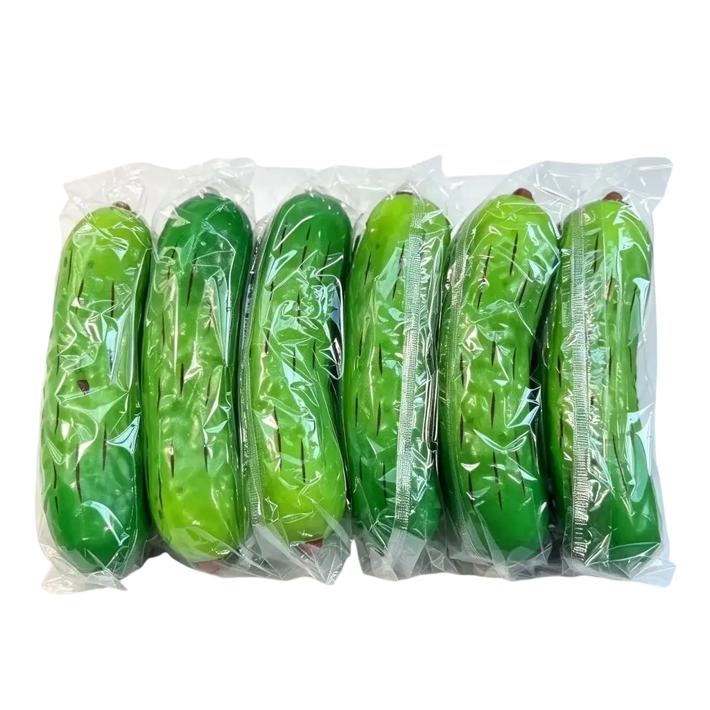 Green cucumber-shaped pu slow rising squishy toy with soft pinch music individually wrapped for stress relief