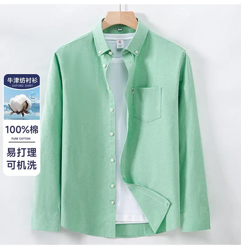 A light green men cotton oxford long sleeve casual shirt made of 100 percent pure cotton with a button-down collar and chest pocket.