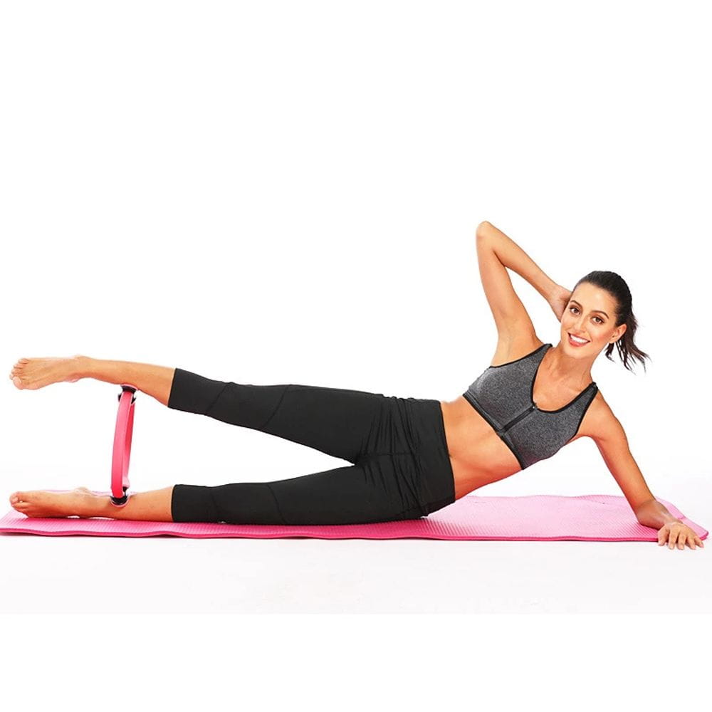 pink resistance band with black adjustable straps designed for Pilates ring fitness magic circle yoga equipment use
