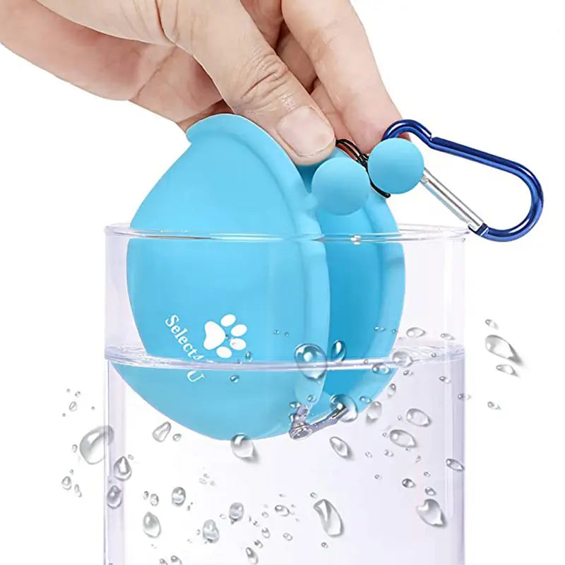 blue silicone pet dog train food snacks pouch with carabiner clip and white paw print logo designed for carrying train food snacks.