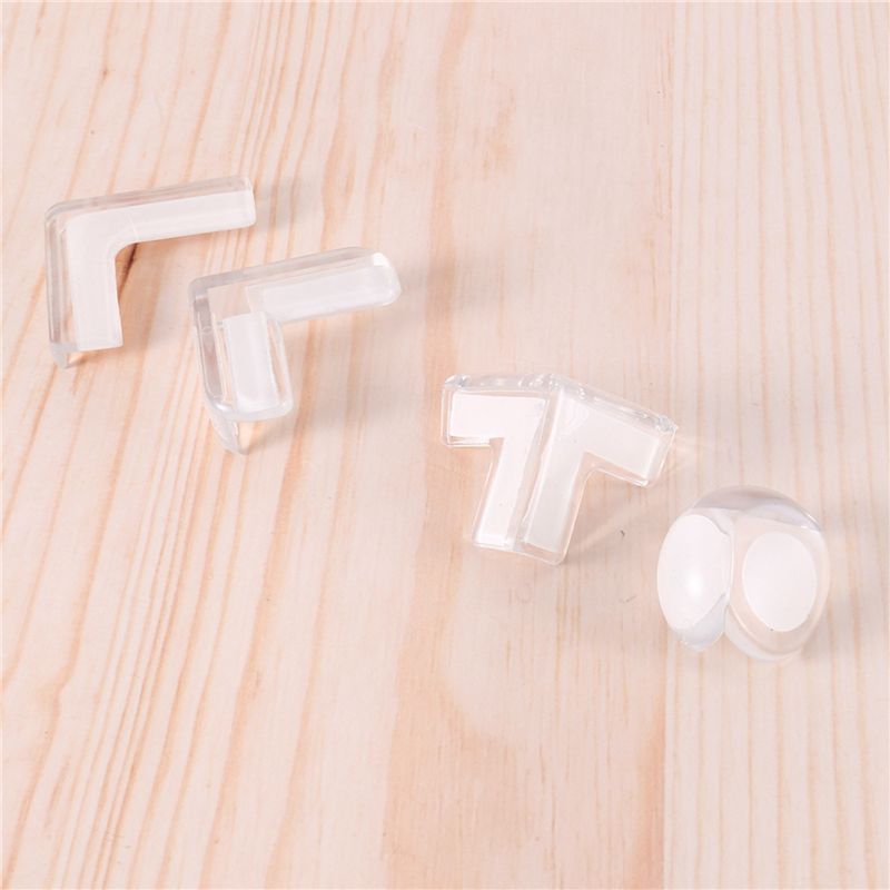 Clear plastic corner protectors and circular bumper pads in a 40 pack designed as child safety guards.