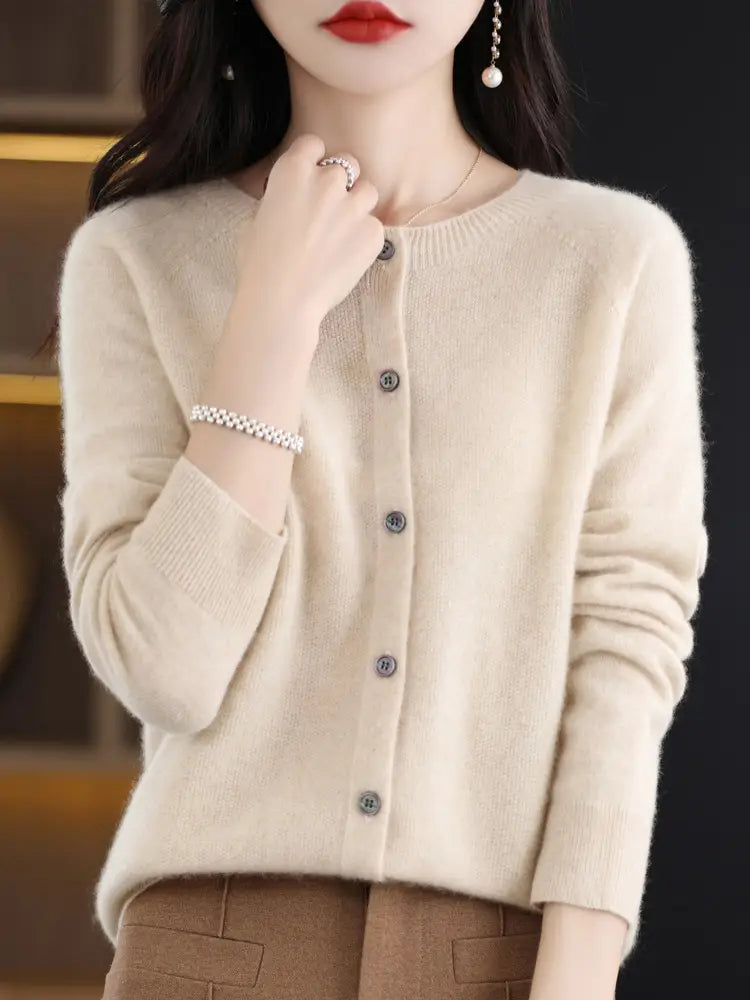 Beige long-sleeved merino wool cardigan with round neckline and dark gray buttons for women cashmere knit sweater.