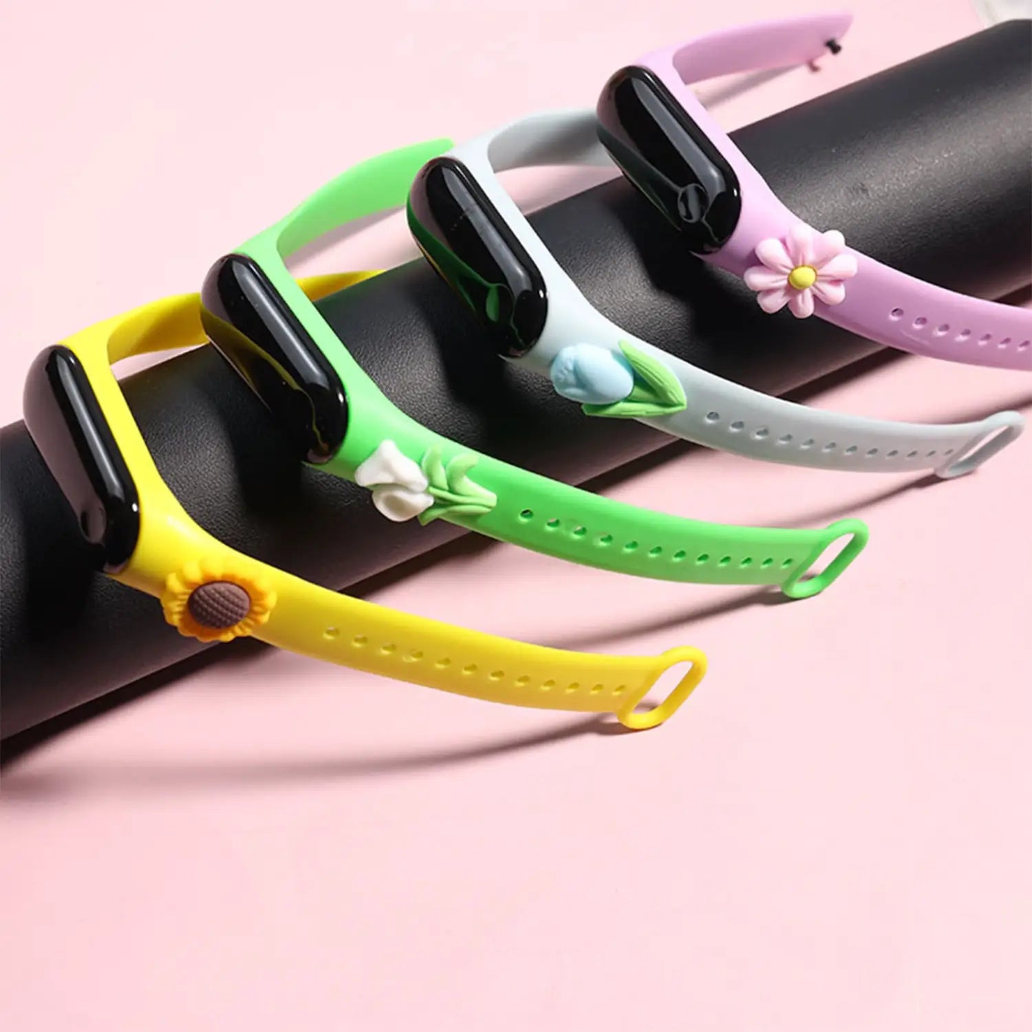 colorful kids silicone digital watches with floral charms feature a life waterproof material type and black rectangular screens with matching silicone straps.