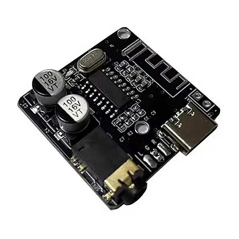 black rectangular electronic module with silver capacitors usb port and circuit components in a cyberpunk led circuit board keychain pendant