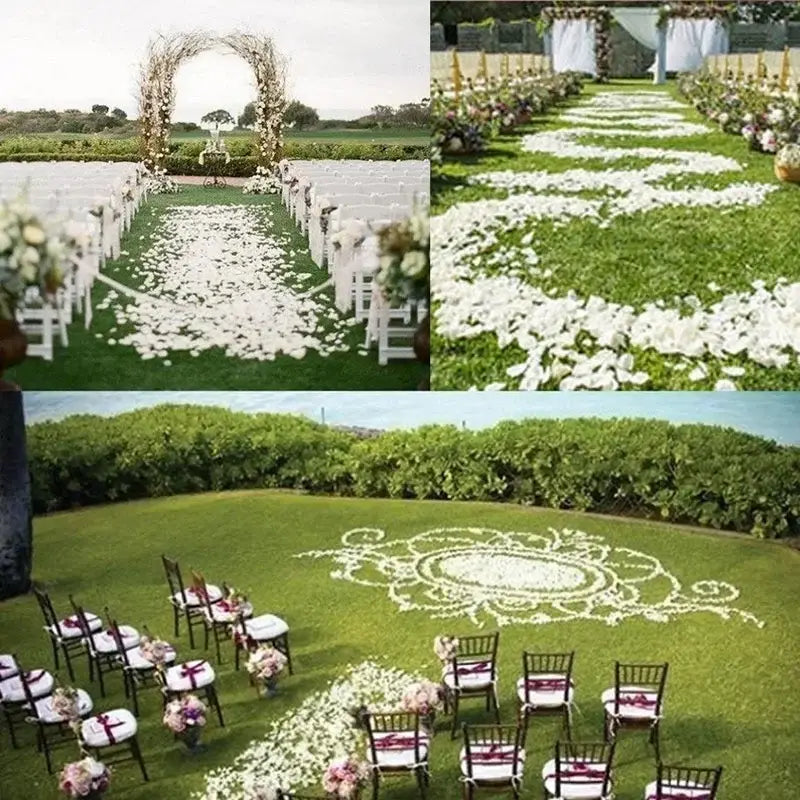 結婚式やパーティーに向けて、緑の芝生の上に複雑な模様として配列された白いシルクのバラの花びら。