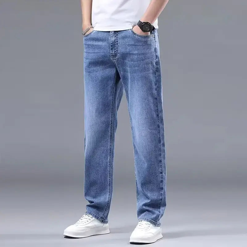 Men fleece lined winter jeans in light-wash blue denim with a loose straight-leg cut and classic stitching.