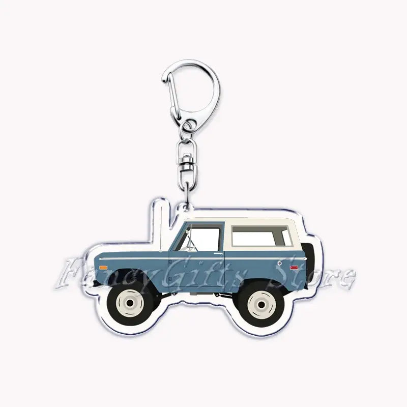 Blue and white vintage-style Nissan Skyline acrylic car keychain with a metallic clip designed as a jeep.