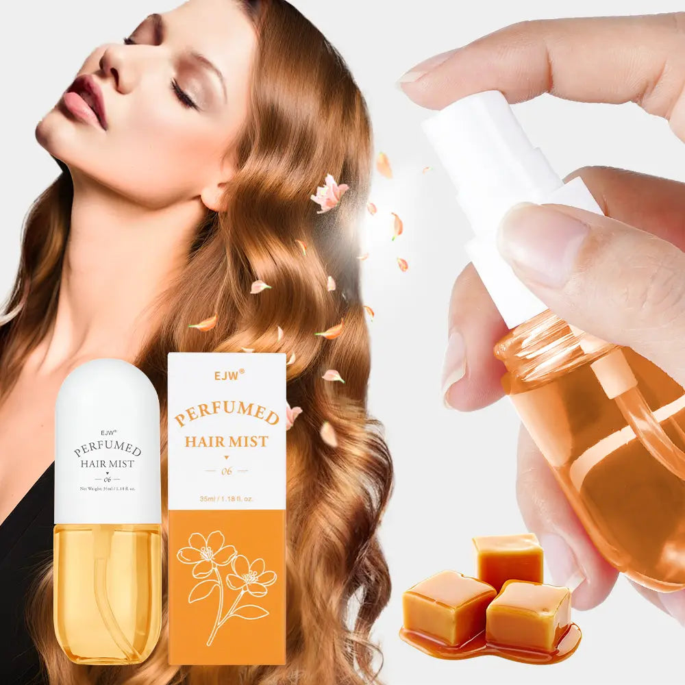 Ejw perfumed hair mist and essential oil spray in a sleek white and amber glass bottle with a matching spray nozzle displayed alongside its orange and white floral designed packaging.