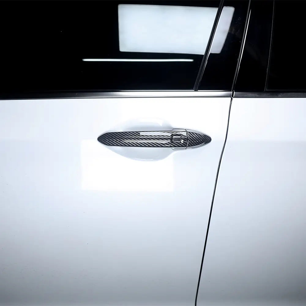 Garniture de protection de poignée de porte pour Genesis G80 en ABS avec texture fibre de carbone et finition métallique élégante, en ensemble de 8 pièces.