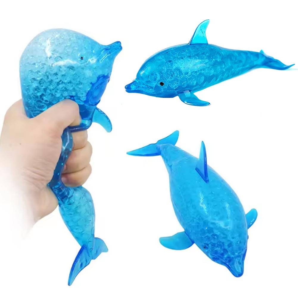 jouet de soulagement du stress dauphin requin bleu translucide, avec un intérieur texturé rempli de gel pour une utilisation en jouet d’attention sensorielle.