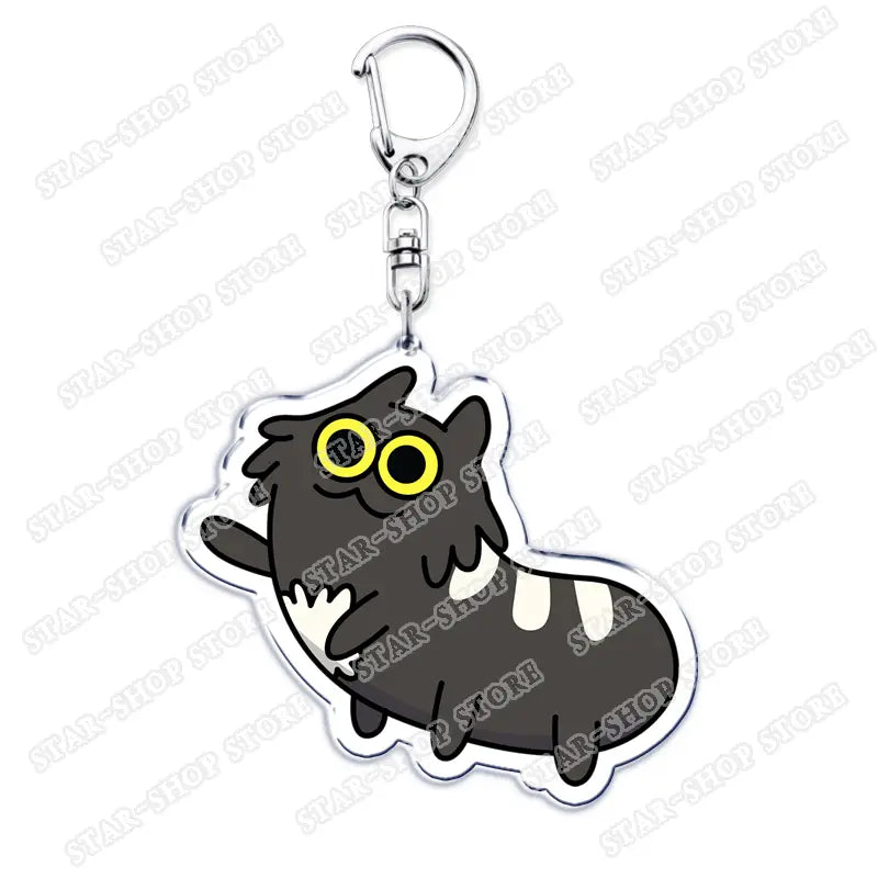 Black and white cartoon cat acrylic keychain with yellow eyes from Amphibia anime featuring a durable cartoon keyring design.