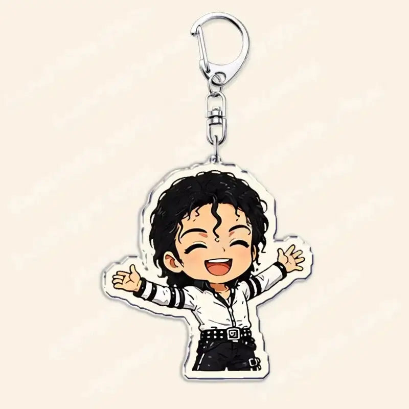 Chibi-style acrylic keychain featuring a smiling Michael Jackson character wearing his iconic white shirt and black pants with striped sleeves.