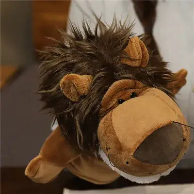 A plush lion hand finger puppet with a brown shaggy mane and tan fur body designed as an educational baby toy in the lion elephant bunny collection.