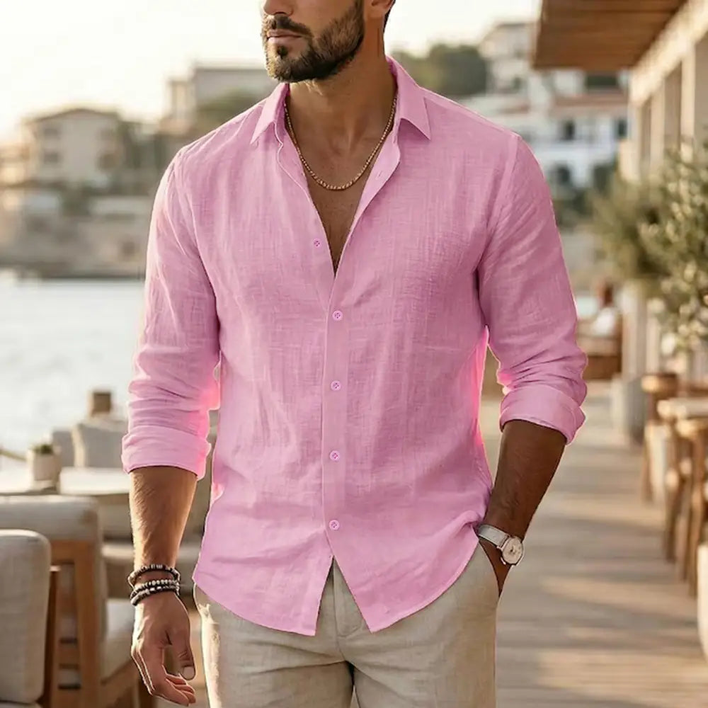 Mens cotton linen long sleeve casual shirt in soft pink with a textured weave and rolled cuffs.