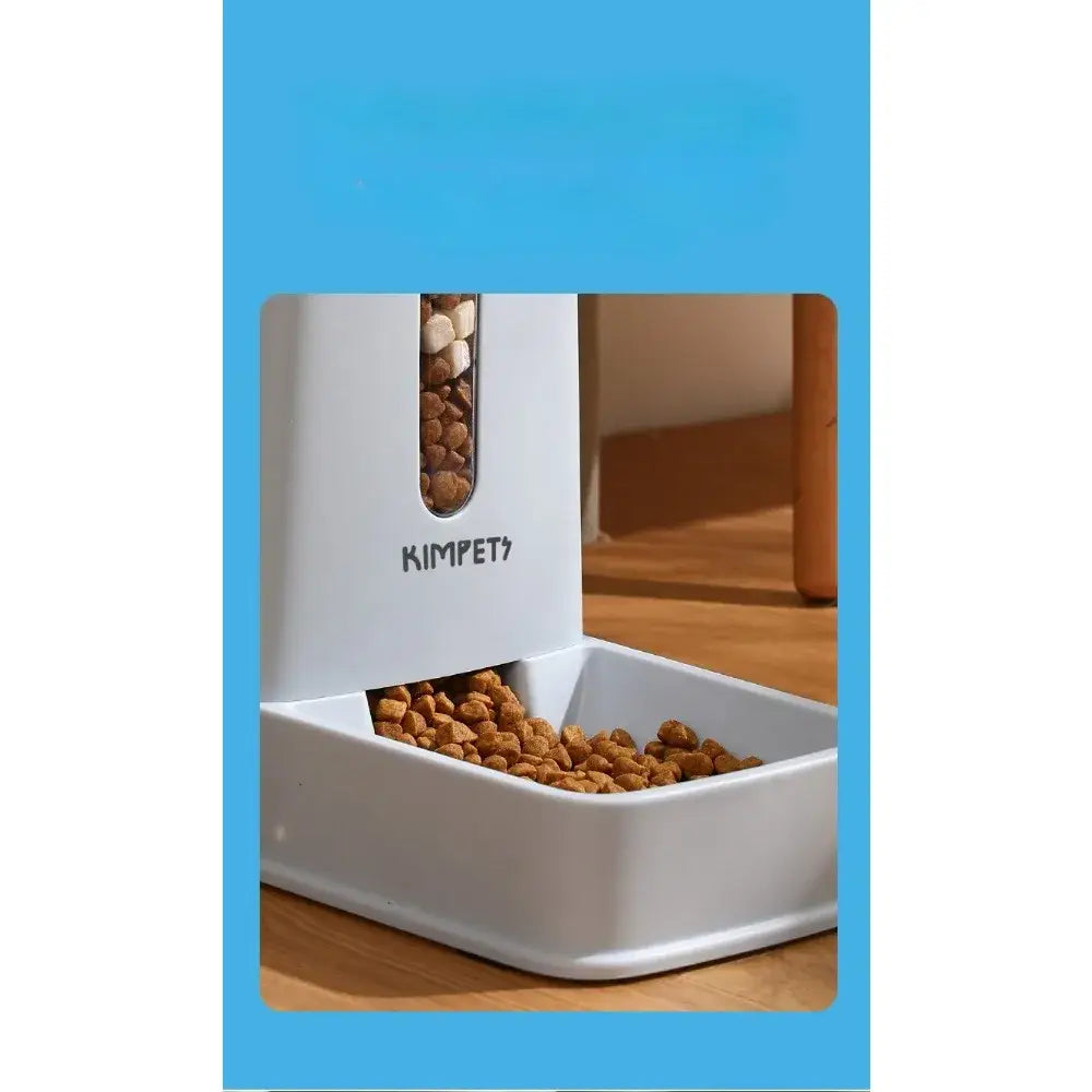 White kimpet automatic pet food dispenser with a transparent window showing brown kibble inside 3.5l plastic feeder.