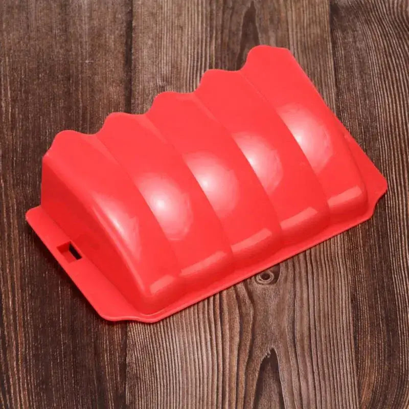 Bright red silicone external rabbit hay feeder food rack with a wavy segmented design for easy dispensing.