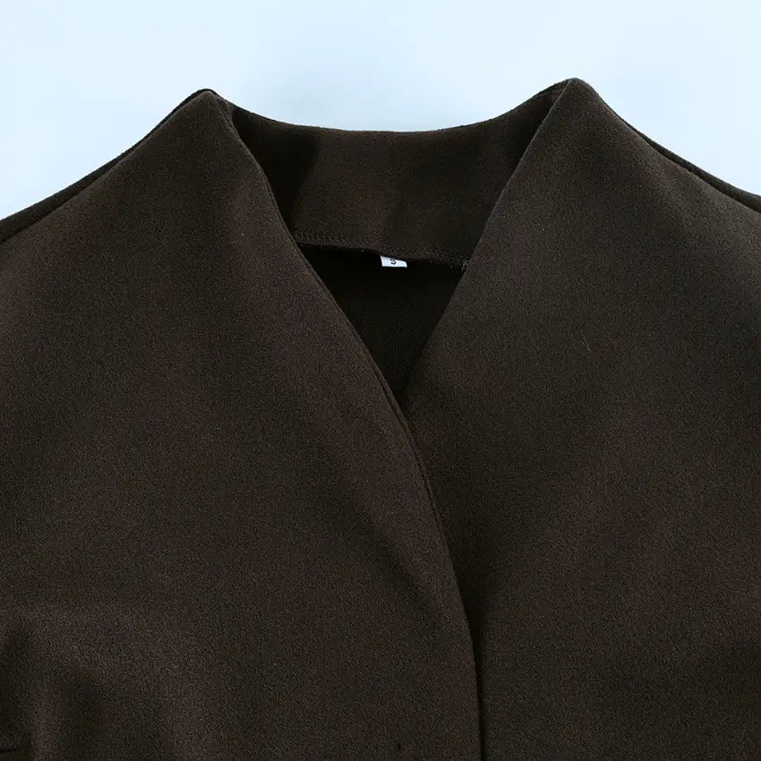 dark brown soft textured fabric collar detail of a wool belted coat brown winter jacket for women