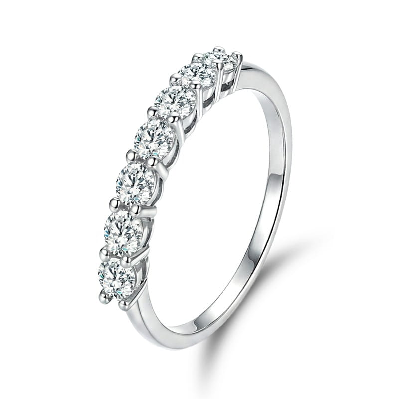 A sterling silver zircon ring for women featuring a sleek silver band with seven round-cut diamonds set in a continuous line along the top.