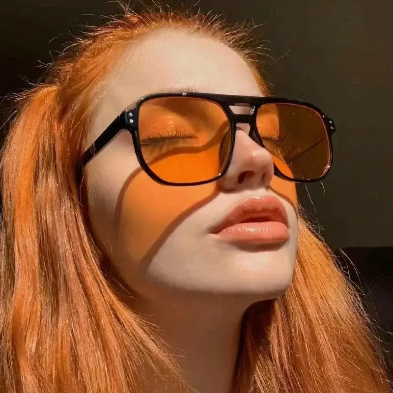 black-framed vintage square sunglasses with vibrant orange uv400 lenses designed for unisex use.