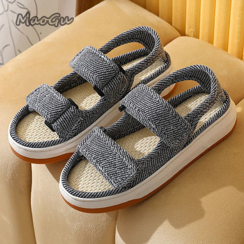 Maogu striped canvas walking sandals gray herringbone-patterned with two adjustable velcro straps and white and orange soles.