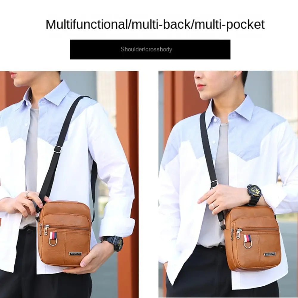 Braune Ledertasche im Sling-Bag-Stil mit schwarzem Gurt und vorderer Reißverschluss-Tasche mit kleinem Flaggenemblem, entworfen als legere Umhängetasche im Schulter-Design für Herren