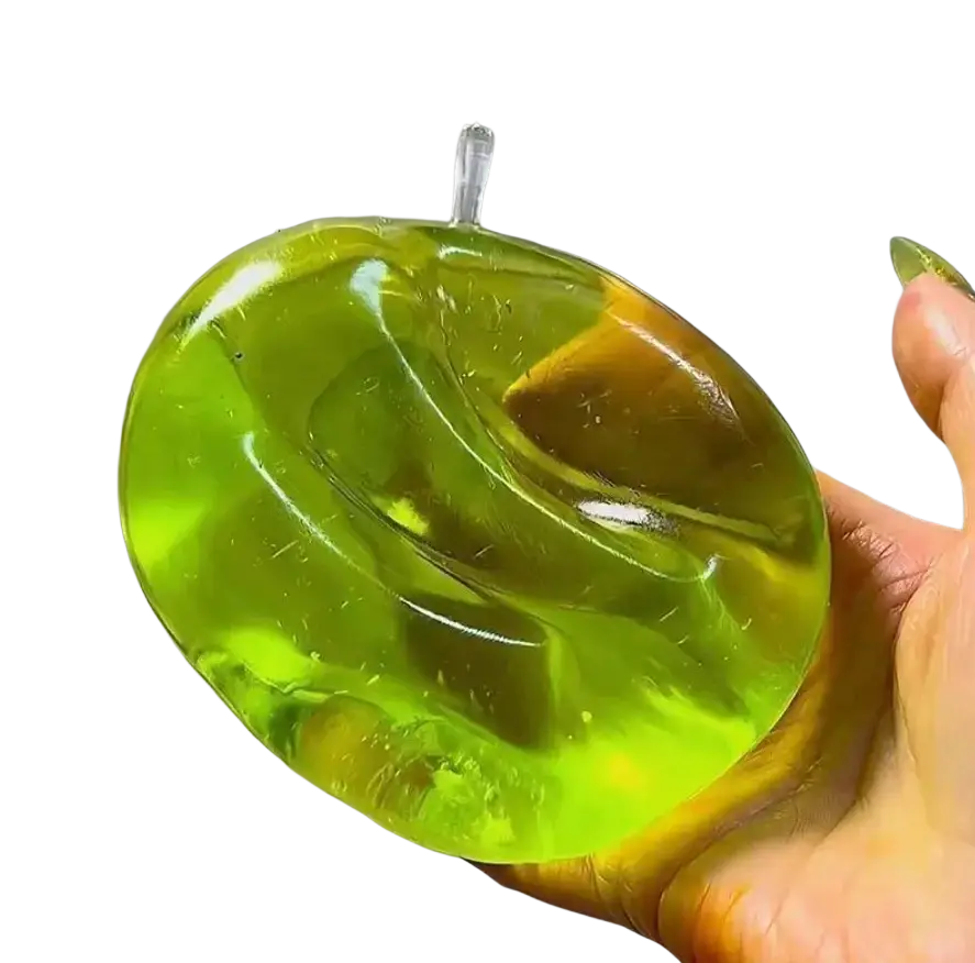 Vibrant green translucent apple-shaped gelatinous soap with clear plastic loop for sensory fidget toy use