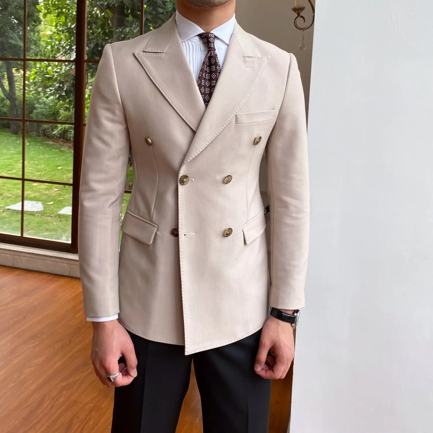 SKU_09_杏色 单西装.jpg Beige double breasted slim fit blazer jacket for men featuring gold toned buttons and subtle stitching details.