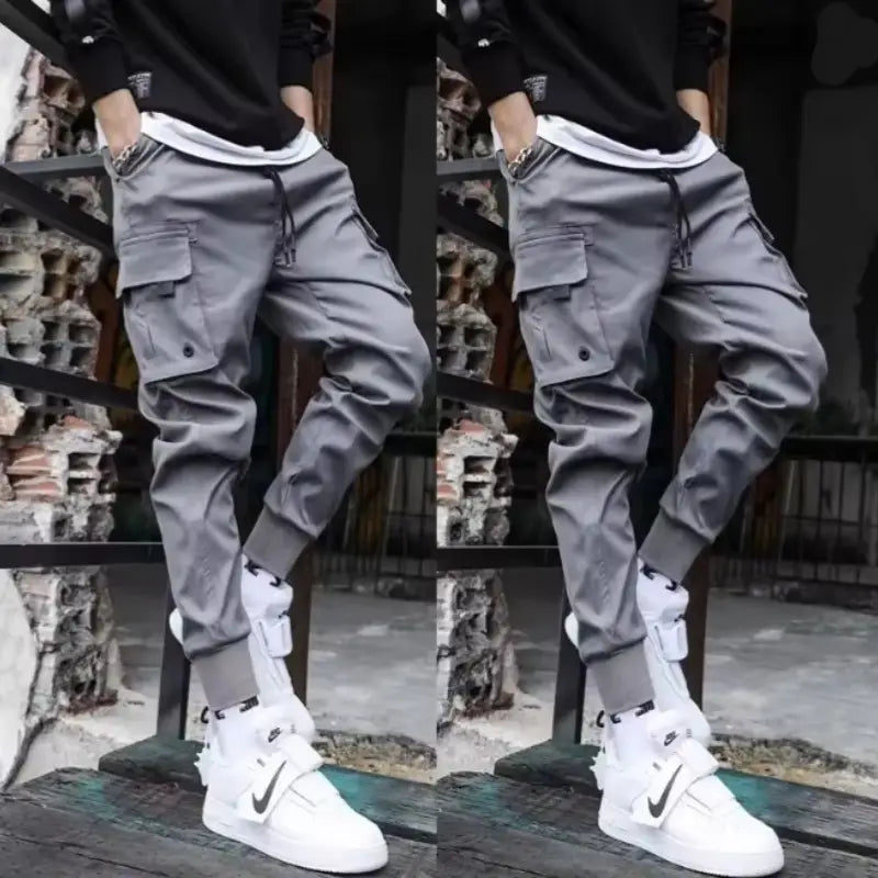 Men tactical cargo pants gray with multiple pockets and elastic cuffs designed for versatile use