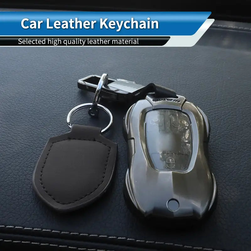 Black leather Shield leather car keychain ring organizer with a sleek metallic car-shaped remote cover.