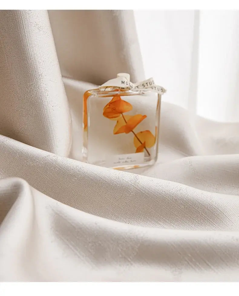 a clear square glass decorative piece with preserved orange leaves suspended in transparent resin, ideal for enhancing living room decor para la sala and complementing blackout drapes with tassel tieback beads