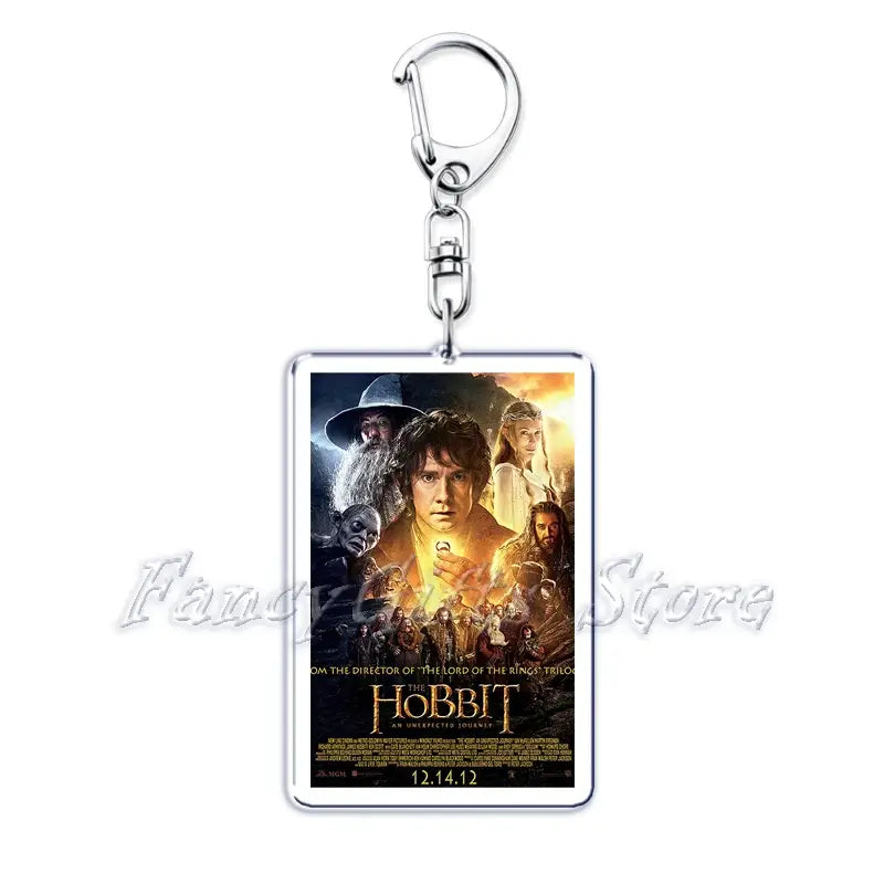 Silver rectangular acrylic keychain featuring a printed movie poster for the Hobbit with film characters from the movie poster acrylic keychain set.