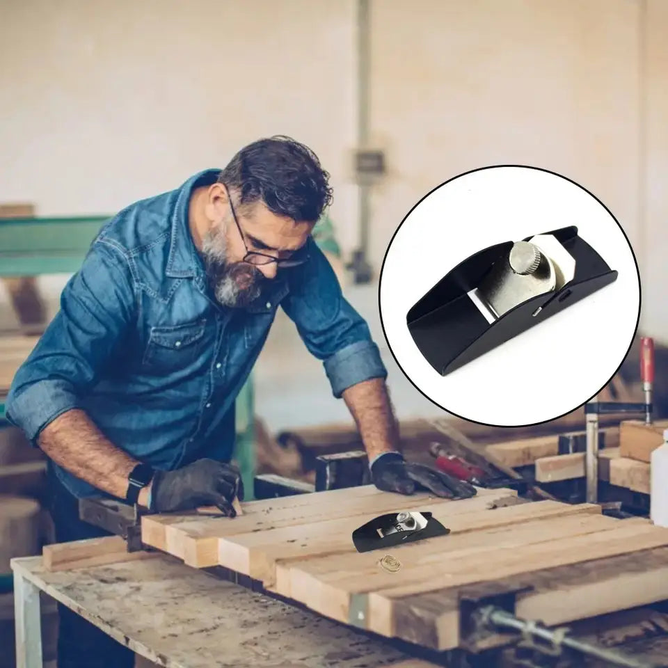 Black metal mini wood hand planer with a silver adjustable knob and flat smooth cutting blade made of aluminum alloy for precision carpentry tasks.