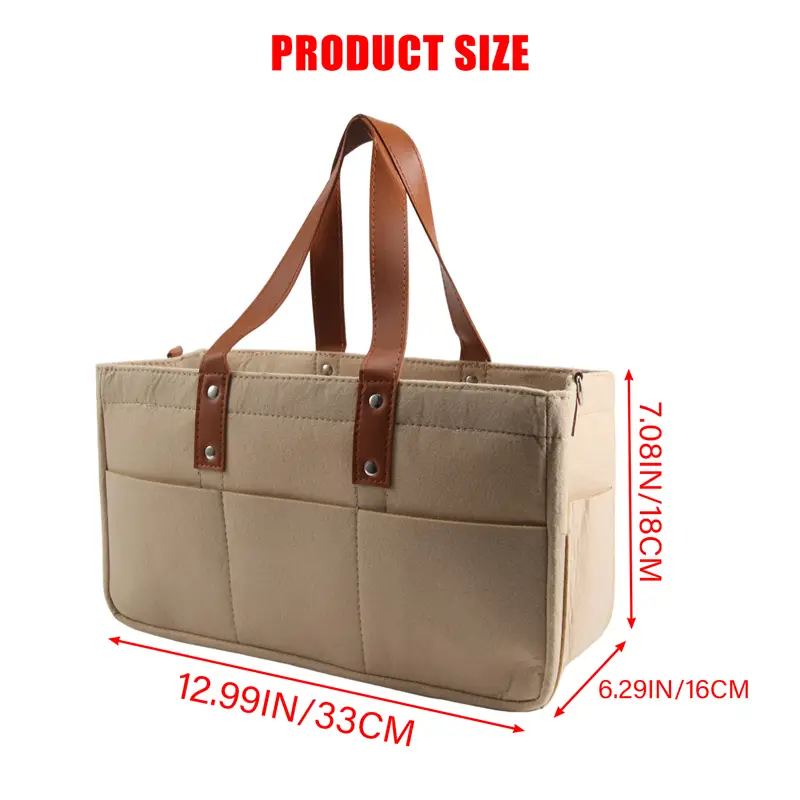 beige quilted felt baby diaper caddy nursery storage basket with brown leather handles and silver-toned metal hardware
