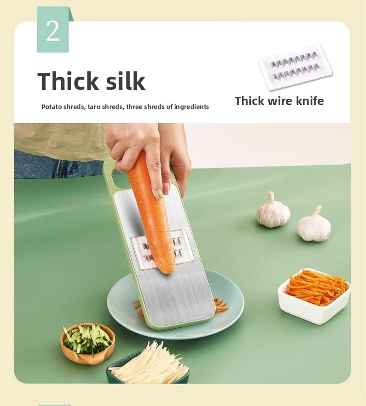 Silver and green multi-functional stainless steel vegetable slicer shredder with thick wire knife for shredding carrots potatoes or taro