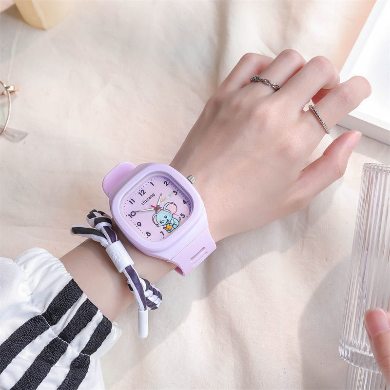 A pastel purple silicone kids luminous cartoon elephant digital watch with a square face featuring a cute elephant design and white numerals.
