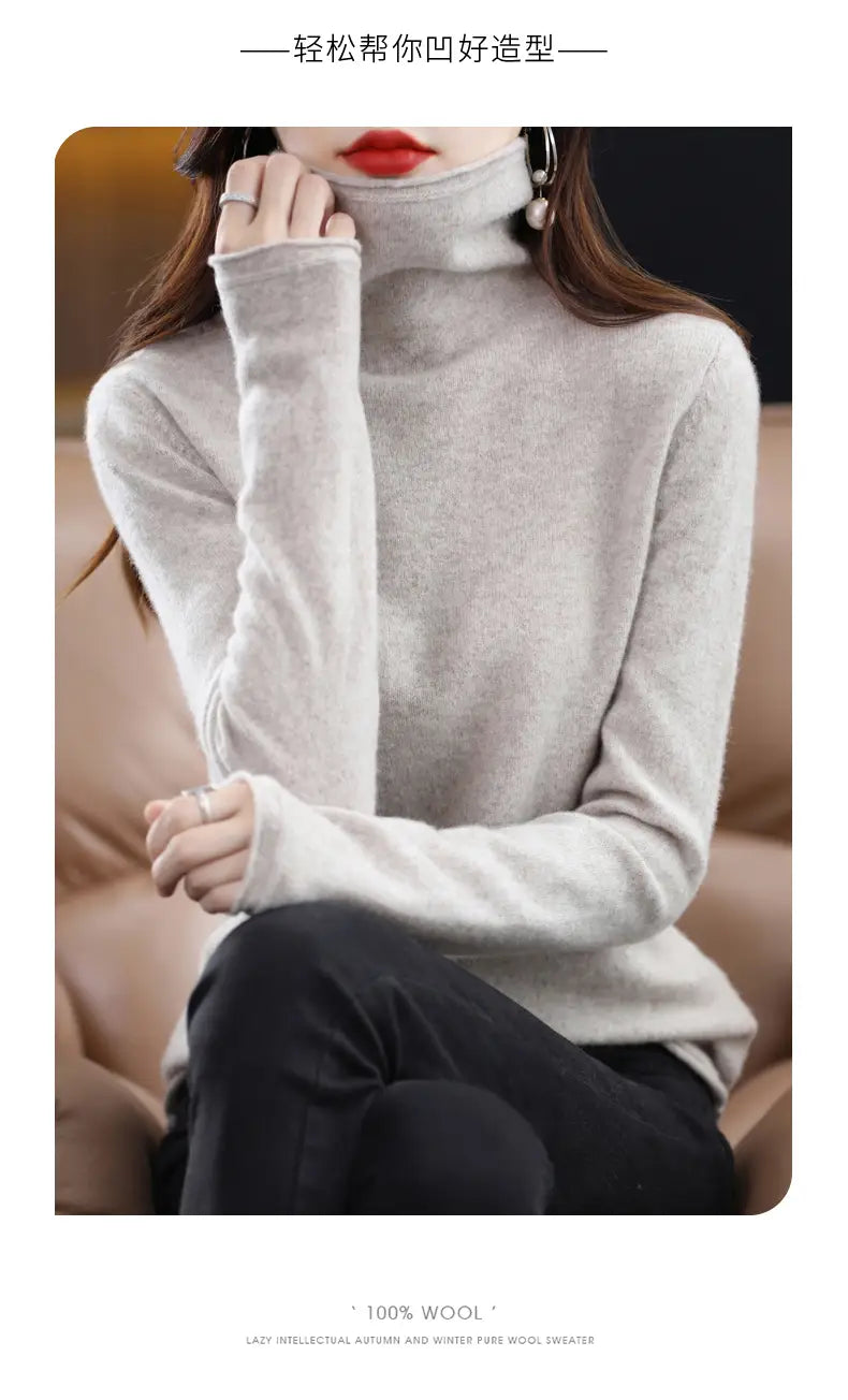 A soft light gray merino wool turtleneck sweater for women made of 100 percent wool.