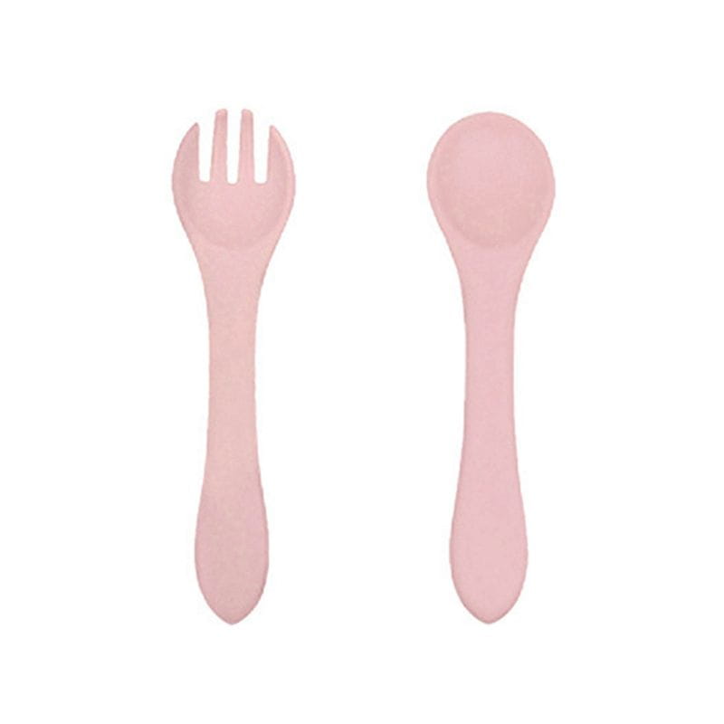 pink silicone baby spoon and fork set with suction base designed for feeding infants