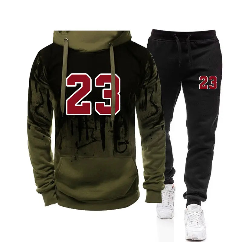 Ensemble sweat à capuche et jogging pour homme portant le numéro 23, en vert olive et noir, avec un graphique rouge 23 sur l’avant, fabriqué dans une matière confortable, idéal pour un style décontracté.