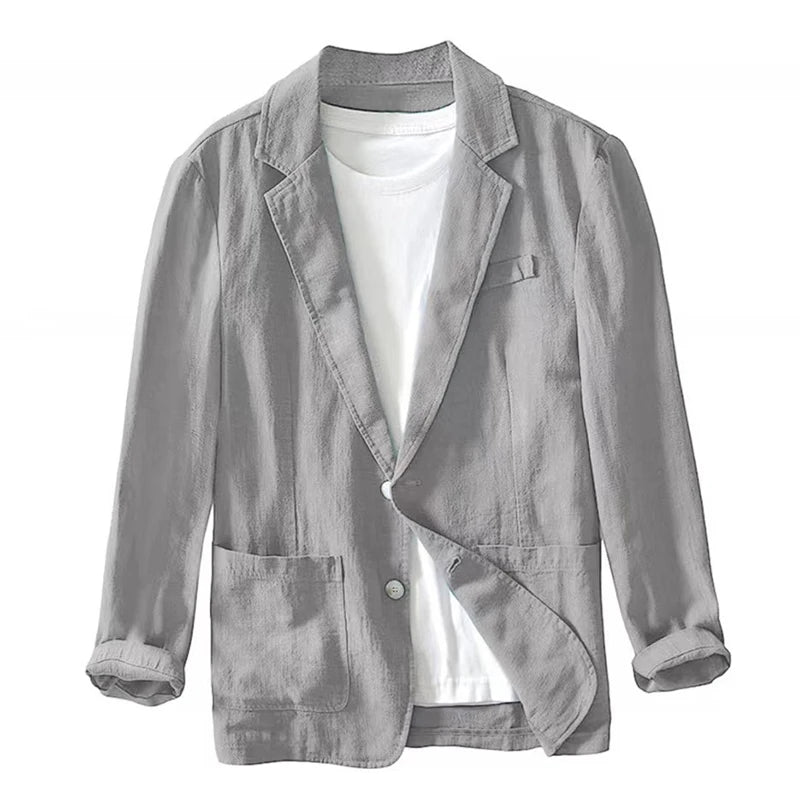 Gray linen men cotton casual retro blazer jacket with a relaxed fit single button closure and rolled up sleeves.