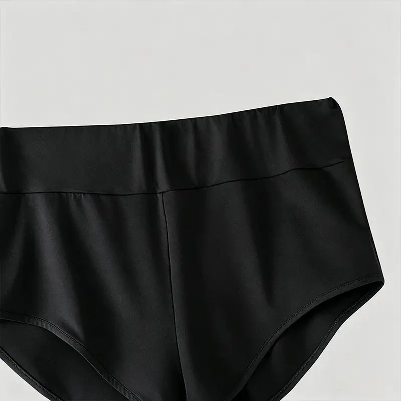 Caleçons de sport en satin noir à taille haute pour hommes, offrant une finition lisse et brillante et un design élégant