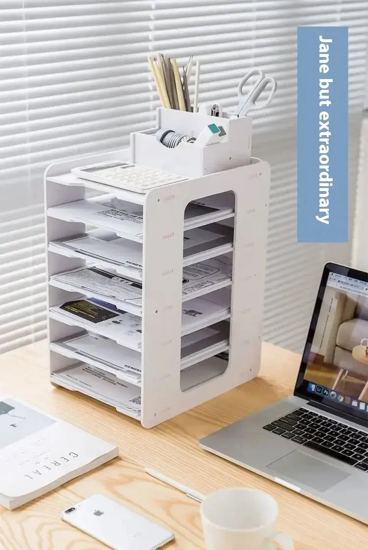 White plastic multi-tiered desktop file organizer and storage rack with integrated pen and scissors holder for office use.