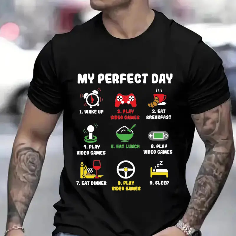 Schwarzes kurzärmeliges Baumwoll-T-Shirt für Herren mit einer farbenfrohen Grafik von „My Perfect Day“ mit Symbolen und Text, die Gaming-Aktivitäten hervorheben.
