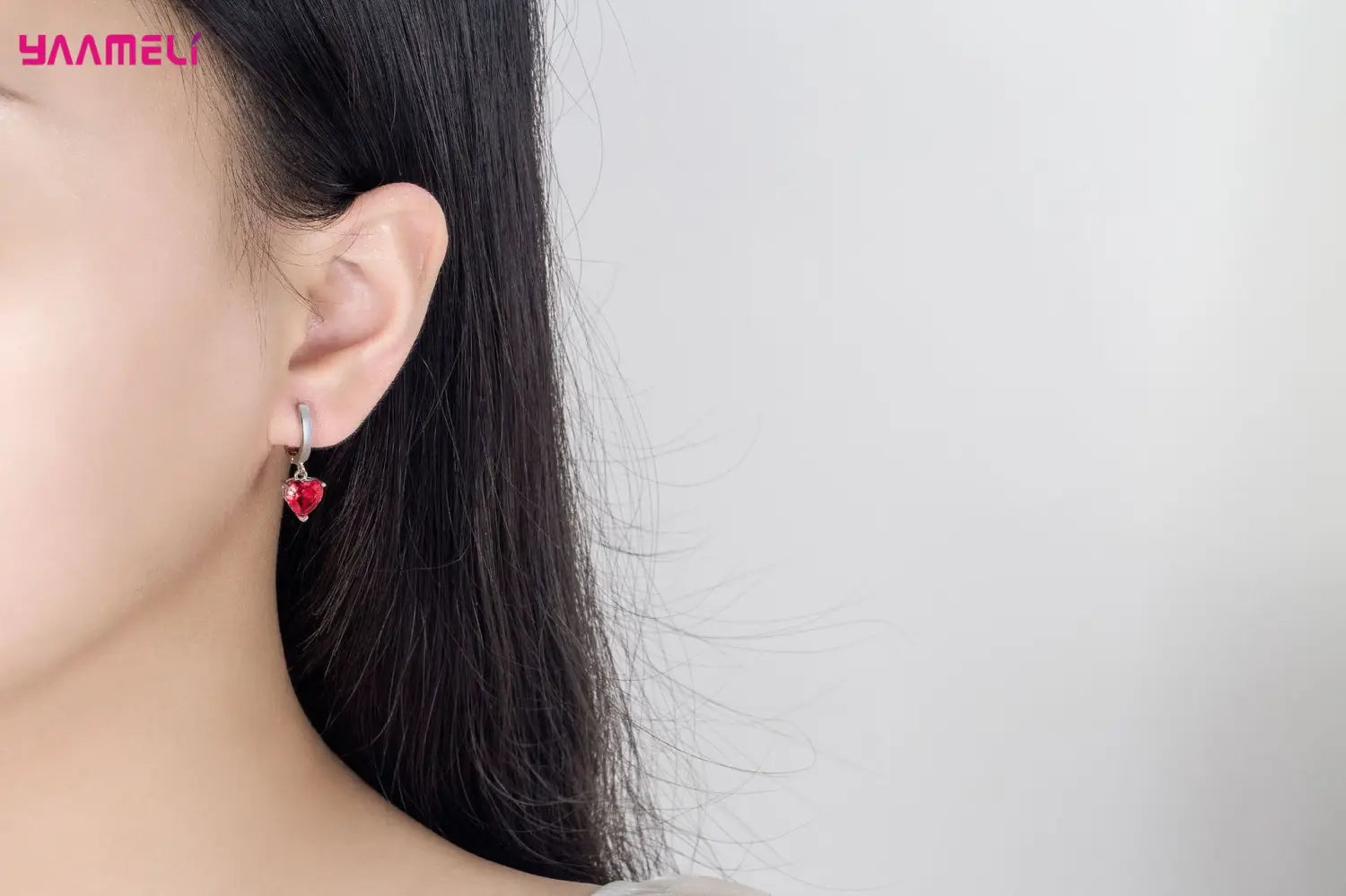 Red heart-shaped pendant earring with a silver-toned hook from the sterling silver heart jewelry set zircon huggies.