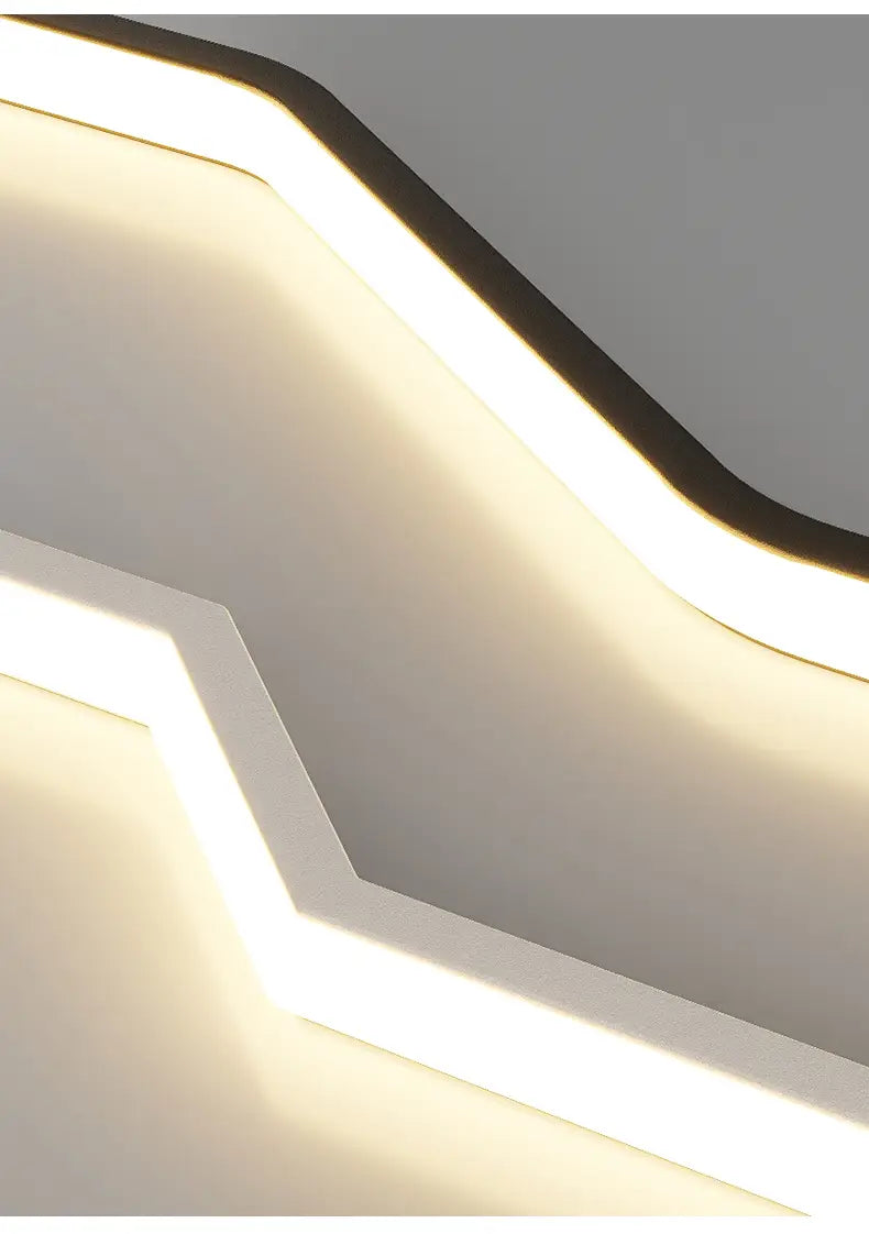 Aplique de pared LED minimalista con una luz de tira moderna, que incluye un diseño geométrico elegante en blanco y negro y tecnología LED eficiente en energía.