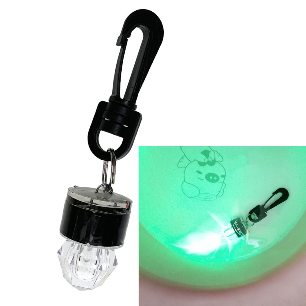 scuba diving water activated safety led beacon featuring a black and clear crystal solar-powered carabiner light with a faceted glass bulb