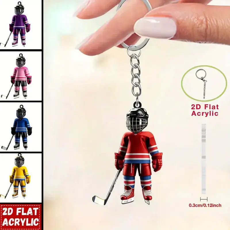 Hockey player acrylic keychain featuring a red and blue 2d flat design with a black helmet holding a stick, ideal as a sports backpack charm.